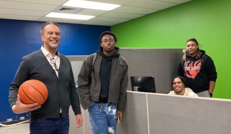 CState Accelerate staff member Don Pollock and students in their new office location