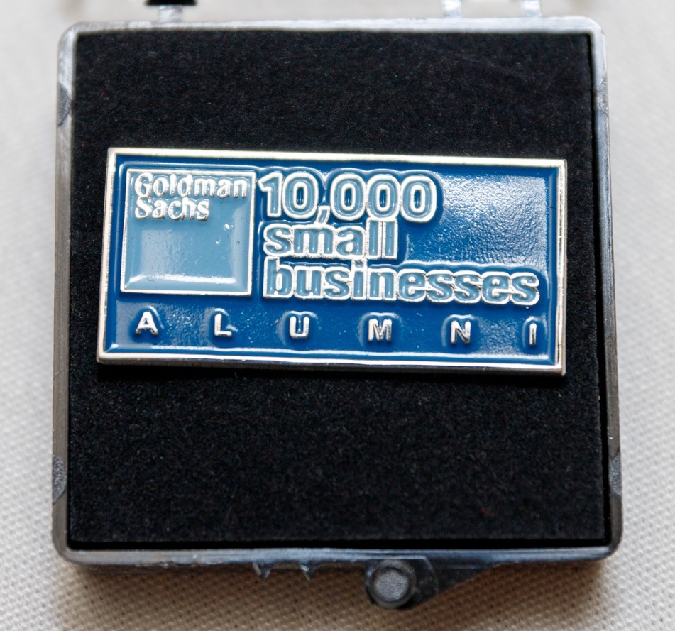 Pin presented to 10,000 Small Businesses program alumni