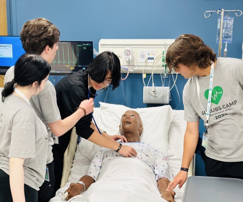 Scrubs Camp students in in Cincinnati State Simulation Lab