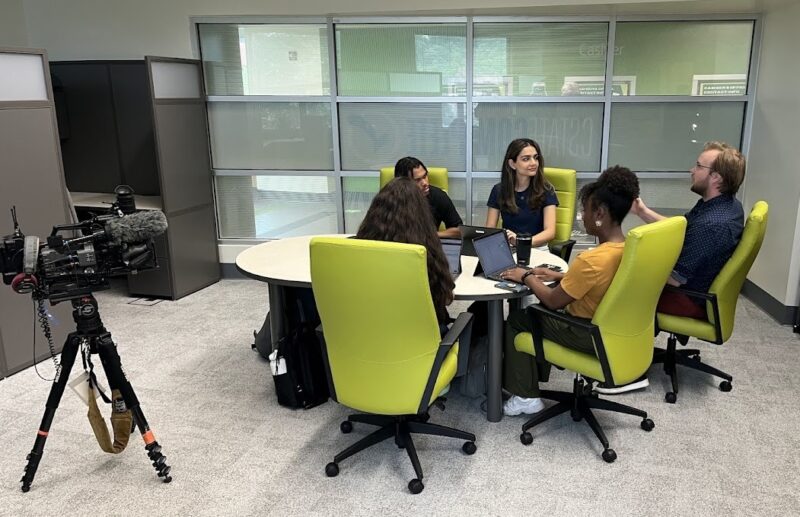 Reporter Keith BieryGolick (far right) interviewing the CState Complete outreach team members