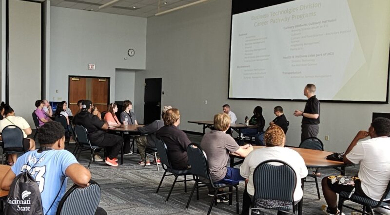 New students listen to a presentation during Welcome Day on July 25