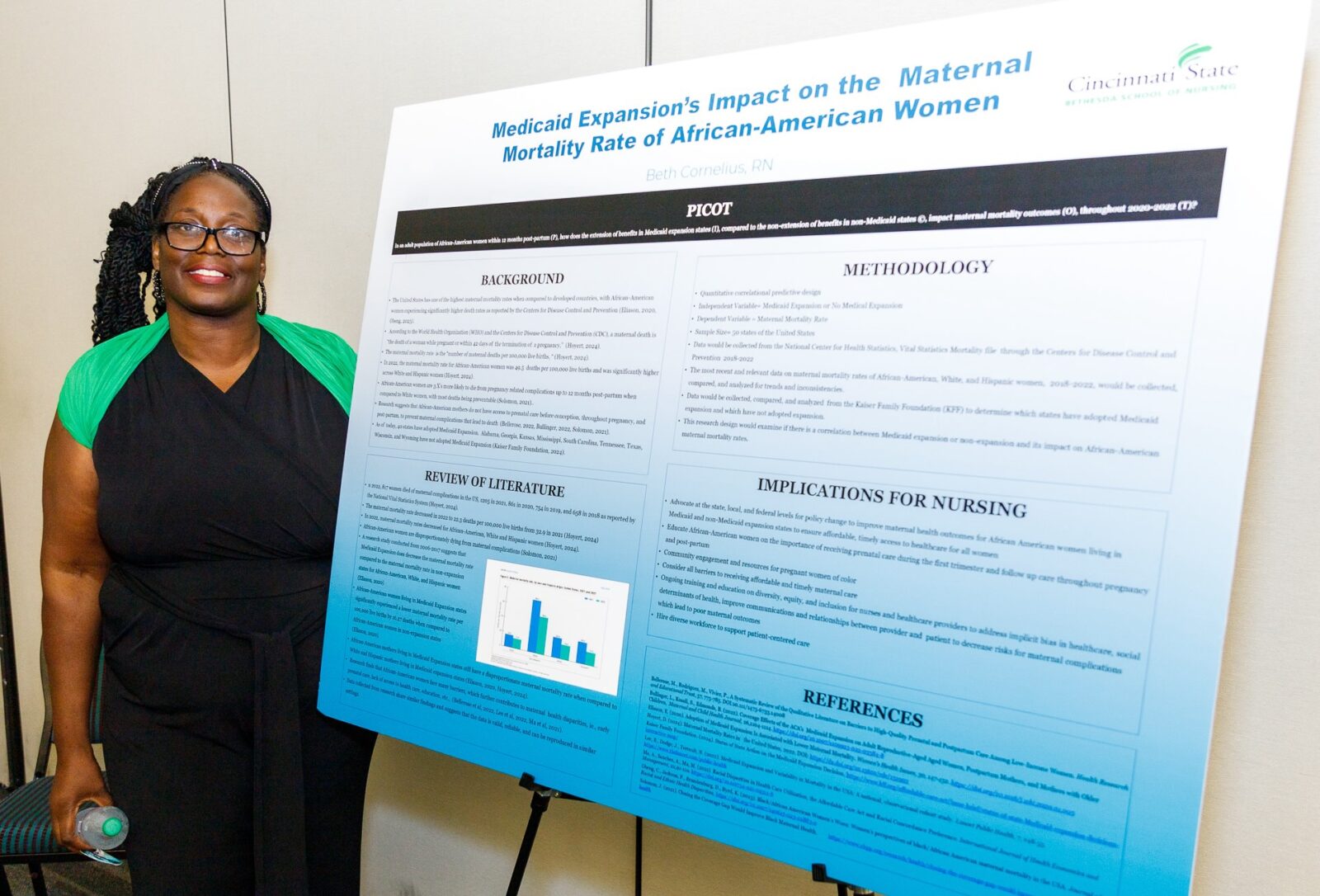 Beth Cornelius, RN, with research poster