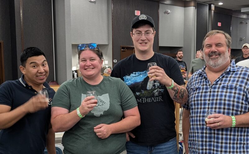 Students Oscar Sanchez, Megan Bowersox, and Joel Davidson, and faculty member Larry Feist at the Bloatarian Brewing League competition