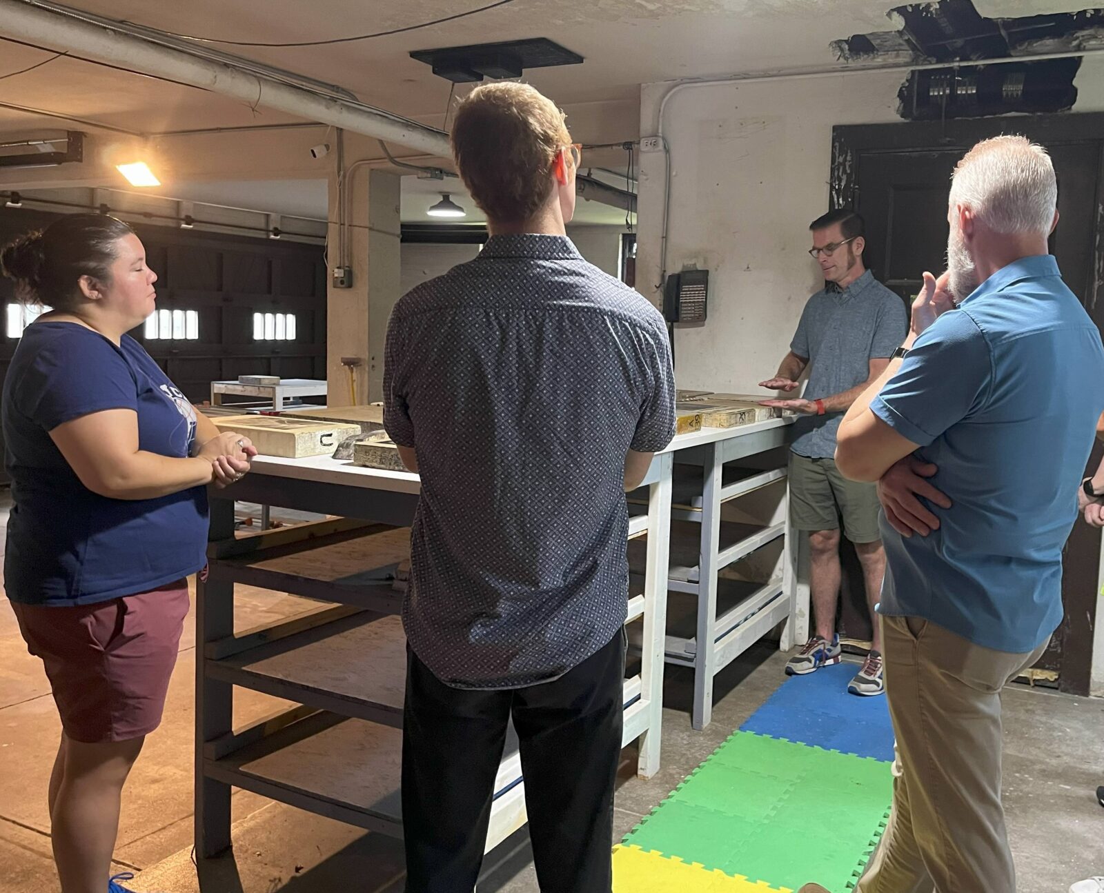 Faculty Senate members in the Print Shop at the Manifest Drawing Center