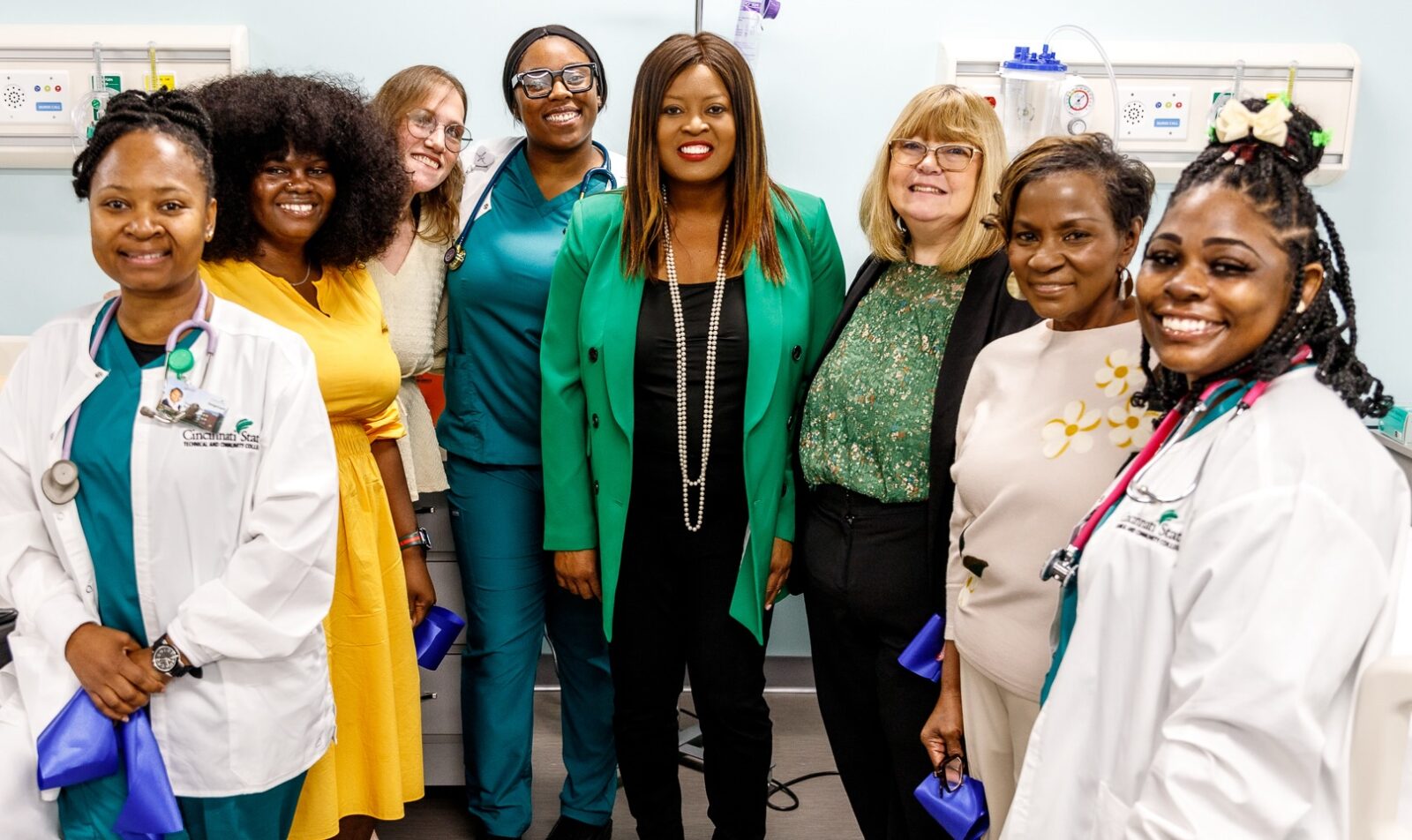 Nursing students celebrated with Commissioner Reece (center), Dean Bonnie Smith, and Program Chair Janice Lockett