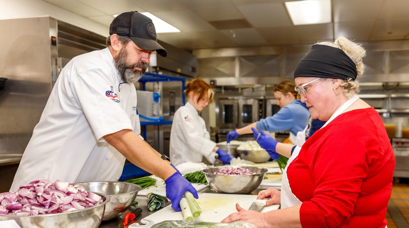 Chef Michael Whitley helped Crissy Ross prepare soup